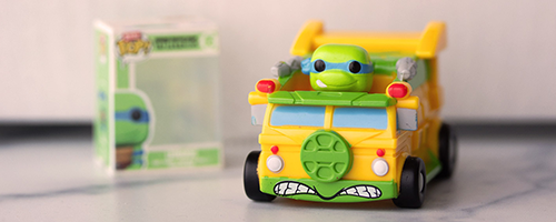 Green product background featuring Funko Bitty POP! DC Comics collection